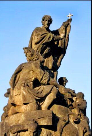 Stone statue of Saint Francis Xaver on the Charles Bridge of Prague