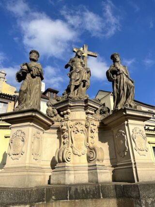 Baroque stone statue of holy Salvator on the Charles Bridge of Prague