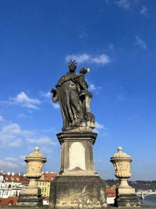 Baroque stone statue of saint Anthony on the Charles Bridge of Prague