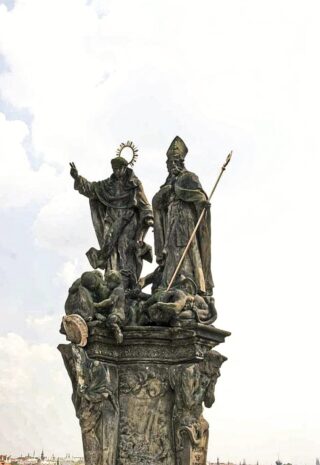 Stone statue of Saint Procop on the Charles Bridge of Prague